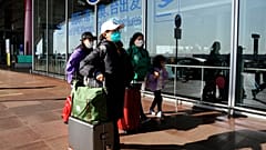 An inbound traveler prepare to cross immigrations at the Guangzhou Baiyun Airport in southern China's Guangdong province on Dec. 25 2022.