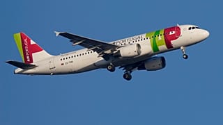 A TAP Air Portugal Airbus A320 approaches for landing in Lisbon.