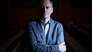 Bulgarian investigative journalist and lead Russia investigator with Bellingcat Christo Grozev poses for a photo session at the Institute of Political Studies
