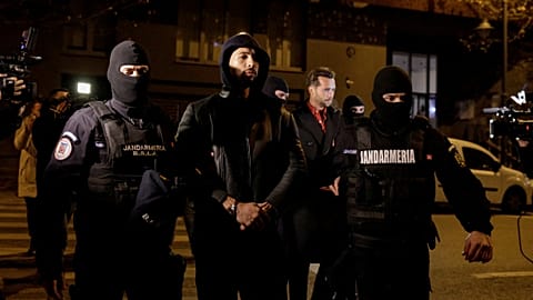 Controversial online influencer Andrew Tate has been arrested during a raid by police in Romania