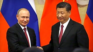 Rusya Devlet Başkanı Vladimir Putin (sol), Çin Devlet Başkanı Şi Cinping