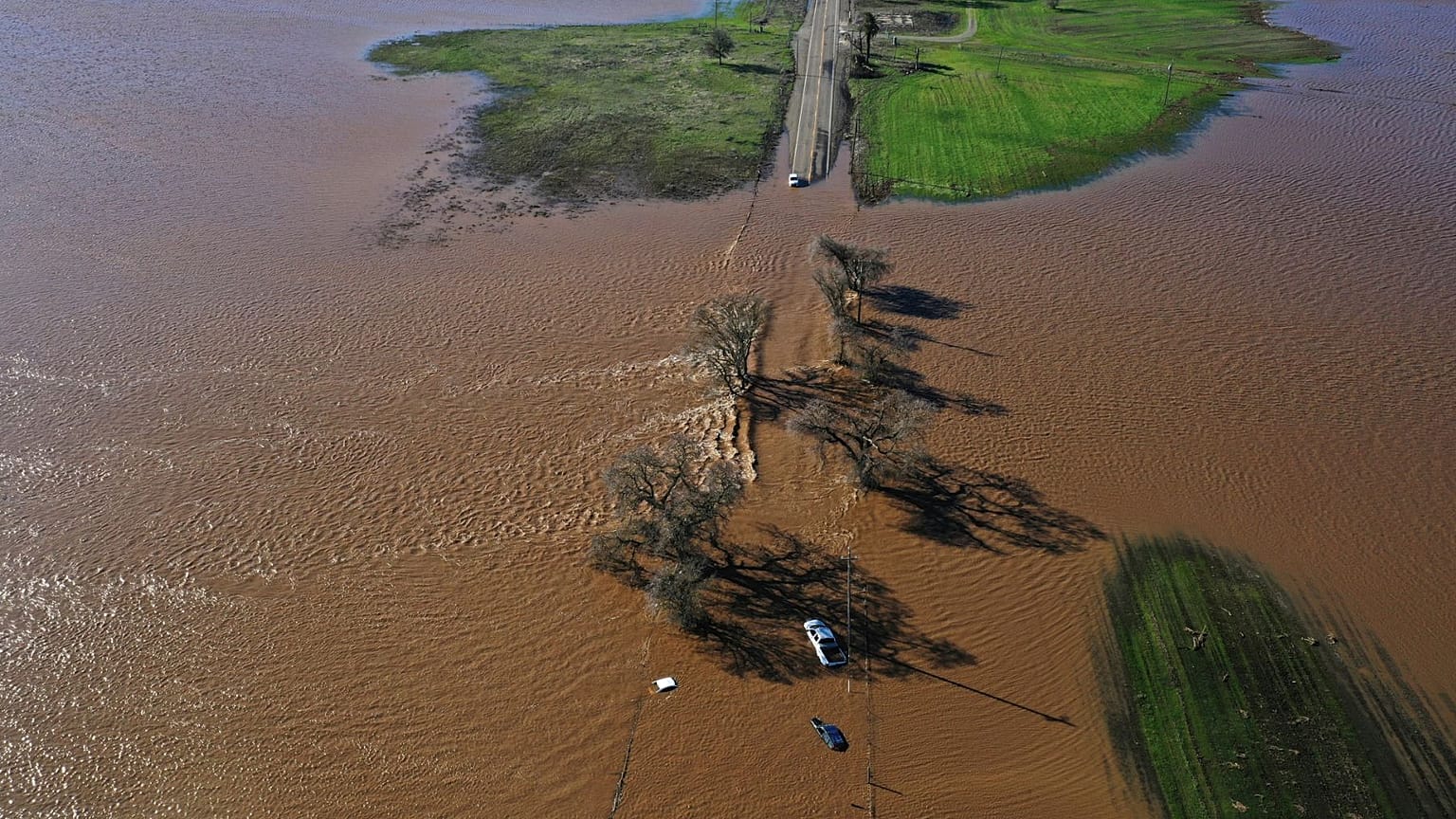Vehicles submerged on Dillard Road west of Highway 99 in south Sacramento County