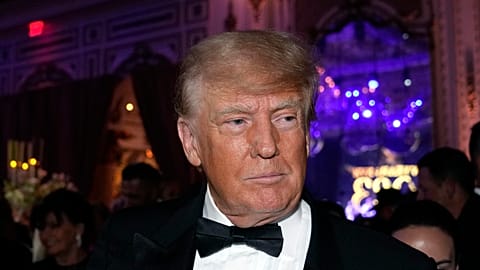 FILE - Former president Donald Trump arrives for a New Year's Eve party at Mar-a-Lago, in Palm Beach,  Dec. 31, 2022.