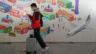 عکس تزئیتی از یک مسافر چینی