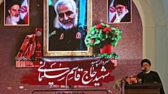 Iranian President Ebrahim Raisi delivers a speech during a commemoration ceremony in Tehran.