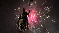 Fireworks light the sky above the Statue of St. Wenceslas at Prague´s Wenceslas Square during the New Year celebrations in Prague, Czech Republic, Jan. 1, 2016.