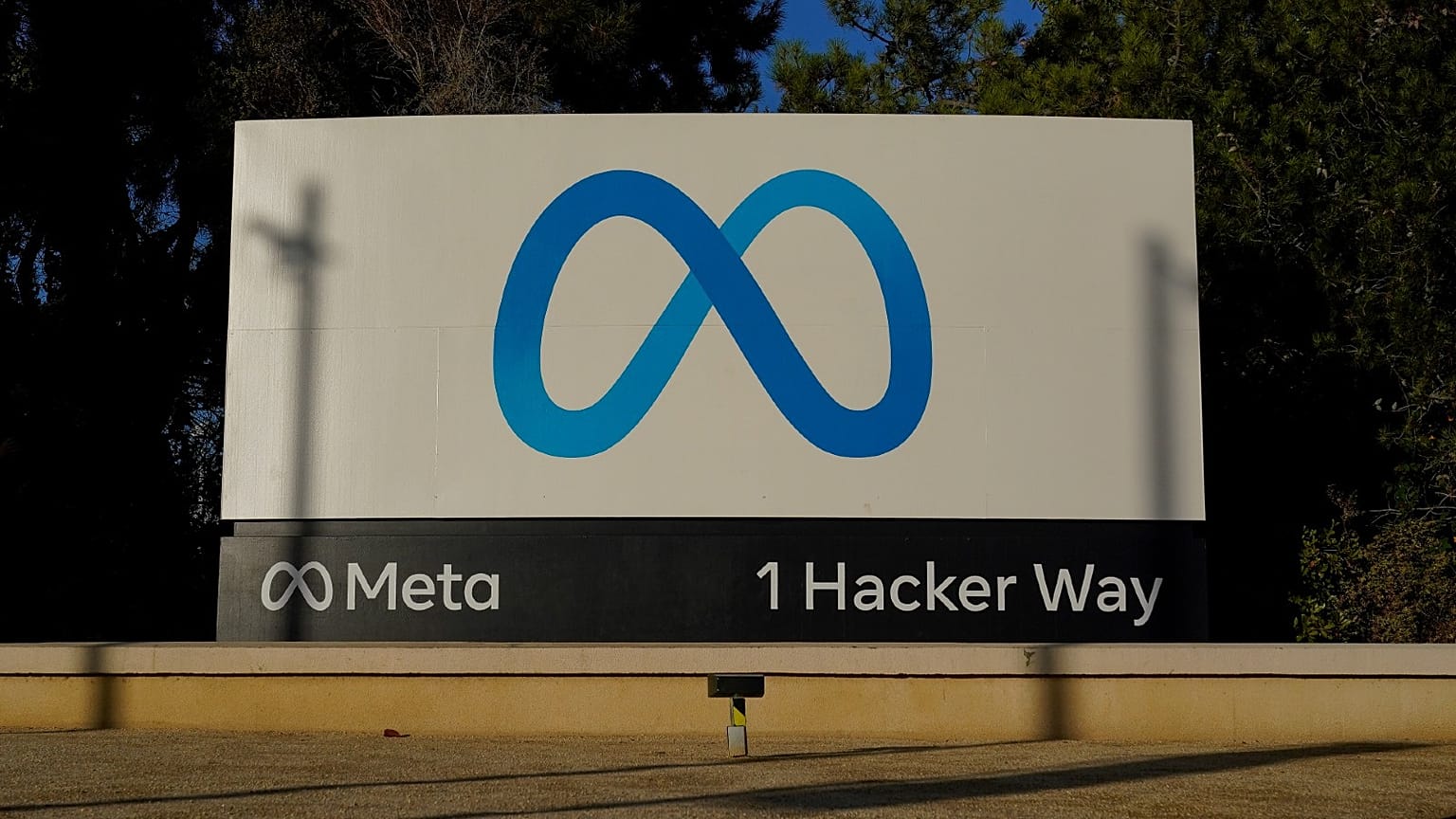 Meta's logo can be seen on a sign at the company's headquarters in Menlo Park, Calif., on Nov. 9, 2022. 