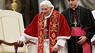 Pope Benedict XVI flanked by personal secretary Archbishop Georg Gaenswein during a Mass in 2013