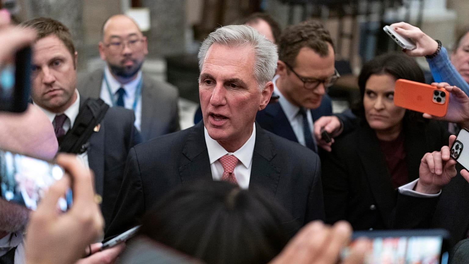 Rep. Kevin McCarthy, R-Calif., talks to reporters as he leaves the House floor after the House voted to adjourn for the evening as the House met for a third day