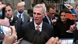 Rep. Kevin McCarthy, R-Calif., talks to reporters as he leaves the House floor after the House voted to adjourn for the evening as the House met for a third day