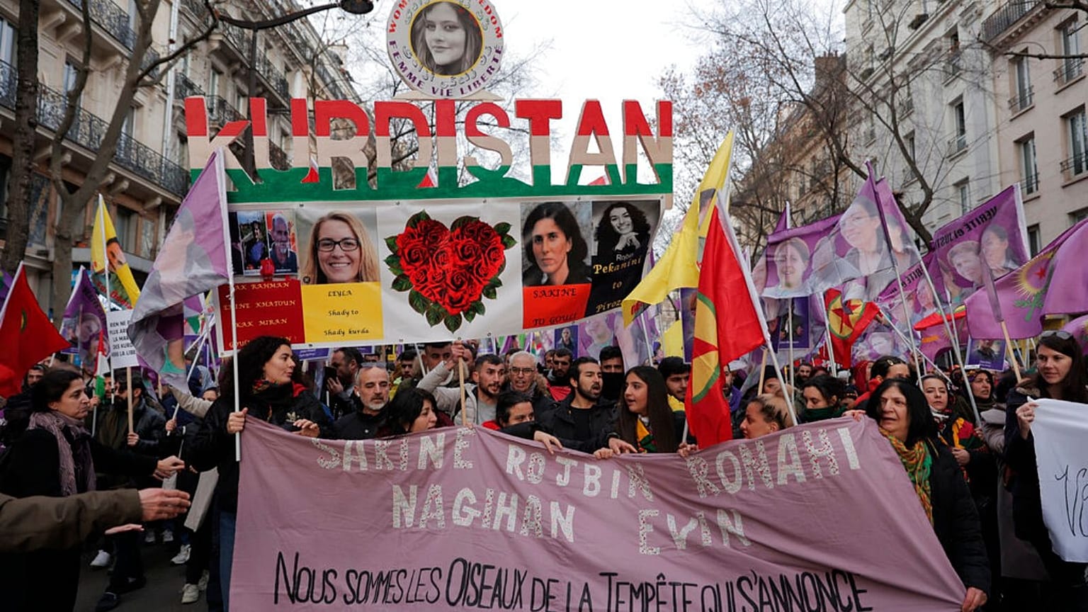 Kurdish activists march during a protest in Paris, Saturday, Jan. 7, 2023