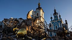 A cupola lies on the ground in front of the Orthodox Church which was destroyed by Russian forces in the recently retaken village of Bogorodychne, Ukraine, Saturday, Jan 7, 23