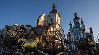 A cupola lies on the ground in front of the Orthodox Church which was destroyed by Russian forces in the recently retaken village of Bogorodychne, Ukraine, Saturday, Jan 7, 23
