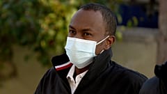 Mohamad Hanad Abdi from Somalia arrives at a court in Mytilene, on the northeastern Aegean island of Lesbos, Greece, Jan. 9, 2023. 