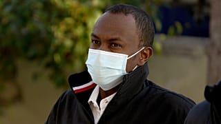 Mohamad Hanad Abdi from Somalia arrives at a court in Mytilene, on the northeastern Aegean island of Lesbos, Greece, Jan. 9, 2023. 