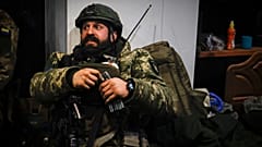 A Ukrainian officer sits in a shelter in Soledar, the site of heavy battles with Russian forces in the Donetsk region, Ukraine. Sunday, 8 January 2023.