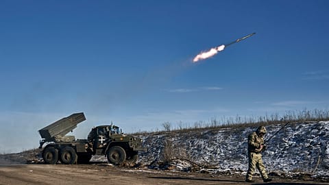 FILE - Ukrainian army Grad multiple rocket launcher fires rockets at Russian positions in the frontline near Soledar, Donetsk region, Ukraine, Wednesday, Jan. 11, 2023. 