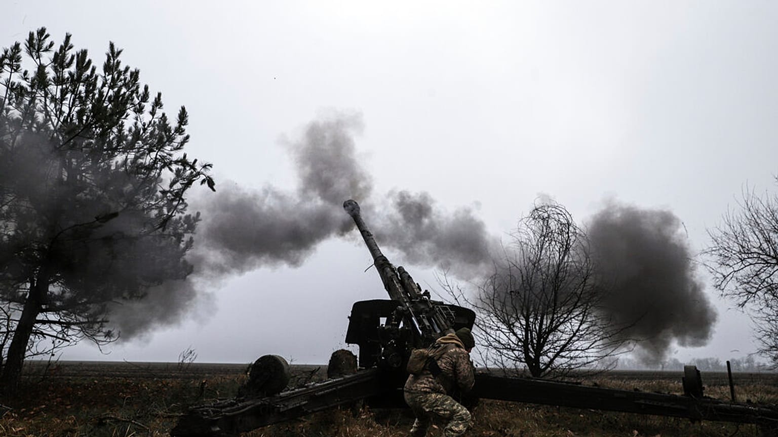 Ukrainian serviceman fires towards Russian positions with a cannon Msta-B in Zaporizhzhia region, Ukraine, Friday, Dec. 16, 2022. 