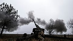 Ukrainian serviceman fires towards Russian positions with a cannon Msta-B in Zaporizhzhia region, Ukraine, Friday, Dec. 16, 2022. 