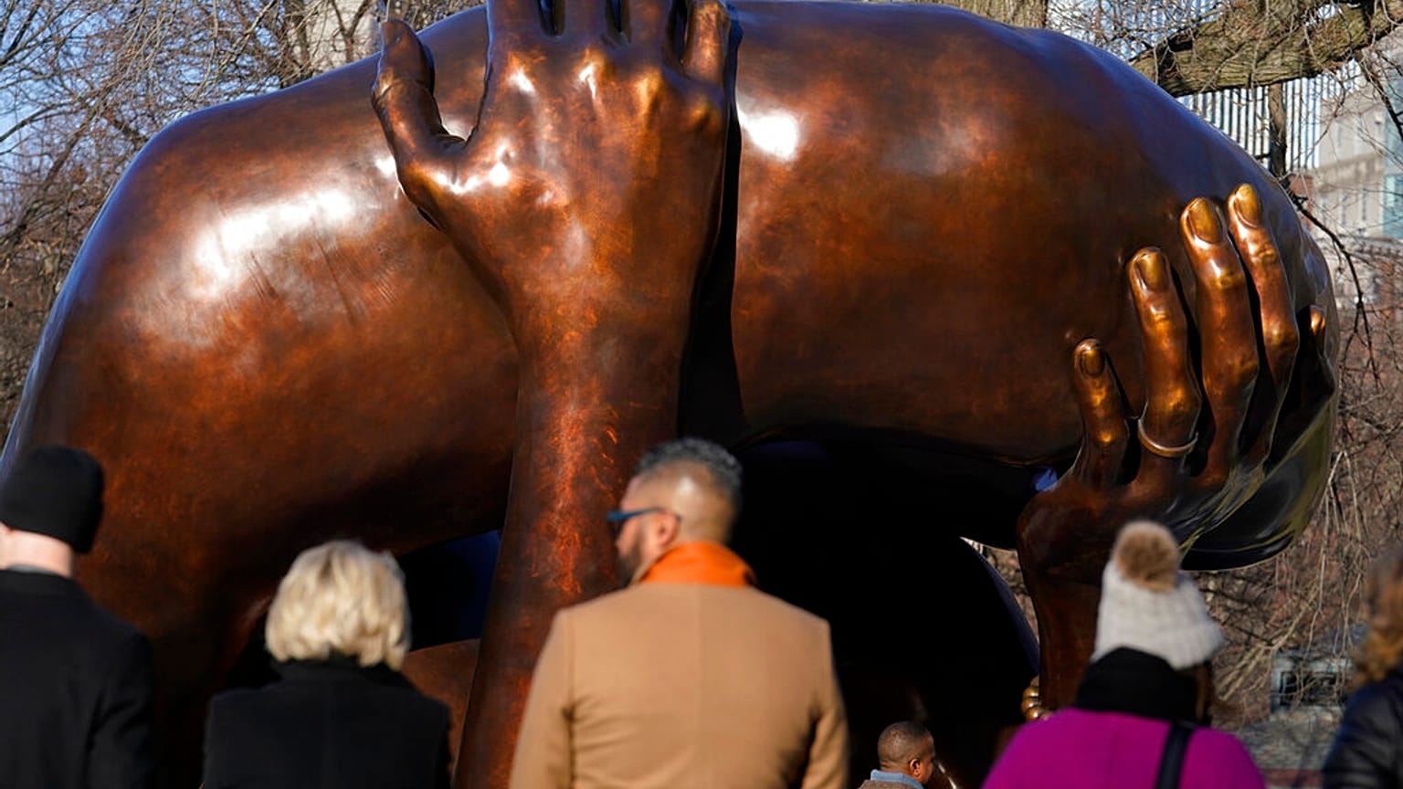 The monument is known as the "Embrace" as depicts 4 intertwined arms
