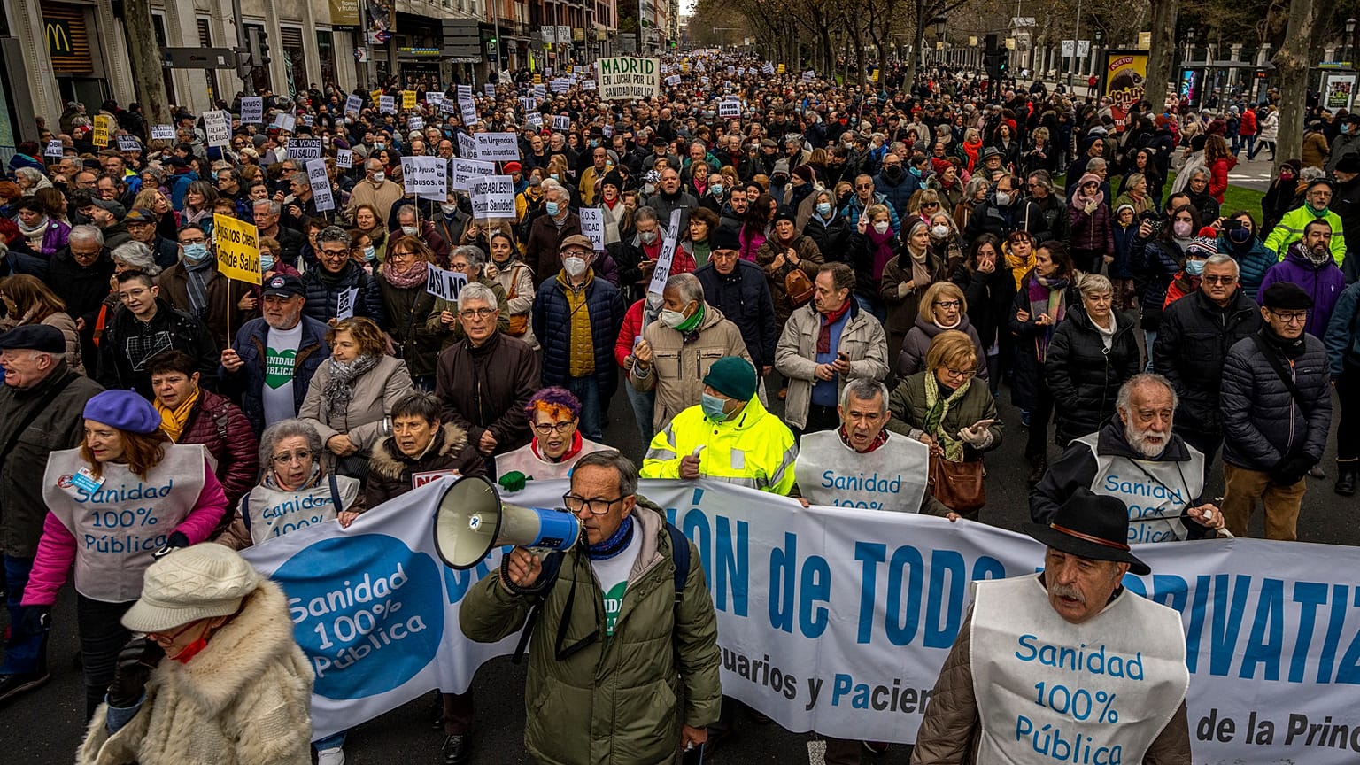 People gather during a protest in support of public health care in Madrid, Spain. Sunday, 15 January 2023.