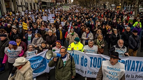 People gather during a protest in support of public health care in Madrid, Spain. Sunday, 15 January 2023.