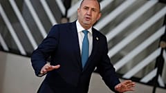 Bulgaria's President Rumen Radev speaks with the media as he arrives for an EU summit in Brussels, Thursday, Dec. 15, 2022. 