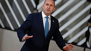 Bulgaria's President Rumen Radev speaks with the media as he arrives for an EU summit in Brussels, Thursday, Dec. 15, 2022. 