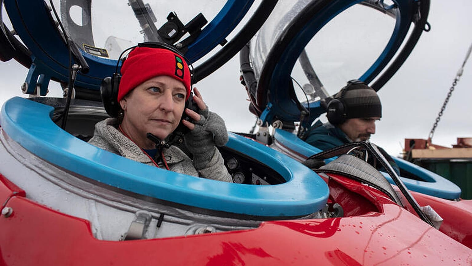 Dr Susanne Lockhart and John Hocevar prepare for a dive off Half Moon Island, Antarctica.