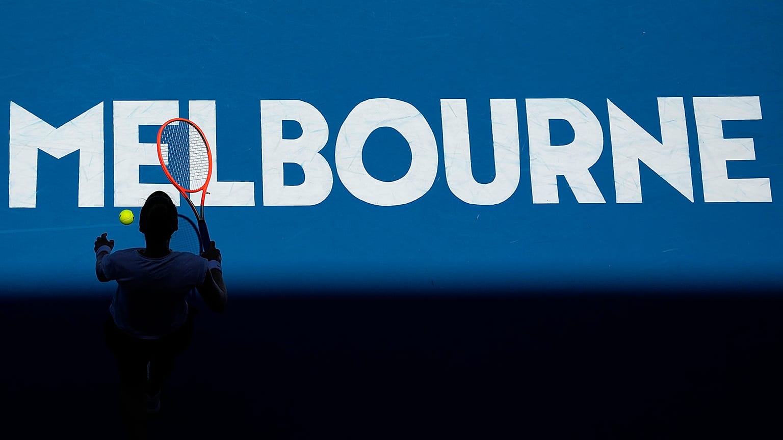 Katherine Sebov of Canada walks to serve to Caroline Garcia of France during their first round match at the Australian Open in Melbourne, 17 January 2023