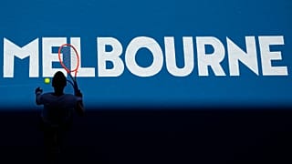 Katherine Sebov of Canada walks to serve to Caroline Garcia of France during their first round match at the Australian Open in Melbourne, 17 January 2023