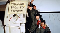 Unidentified U.S. hostages arrive at Rhein-Main U.S. Air Force base in Frankfurt, West Germany after their release from Iran, January 21, 1981.