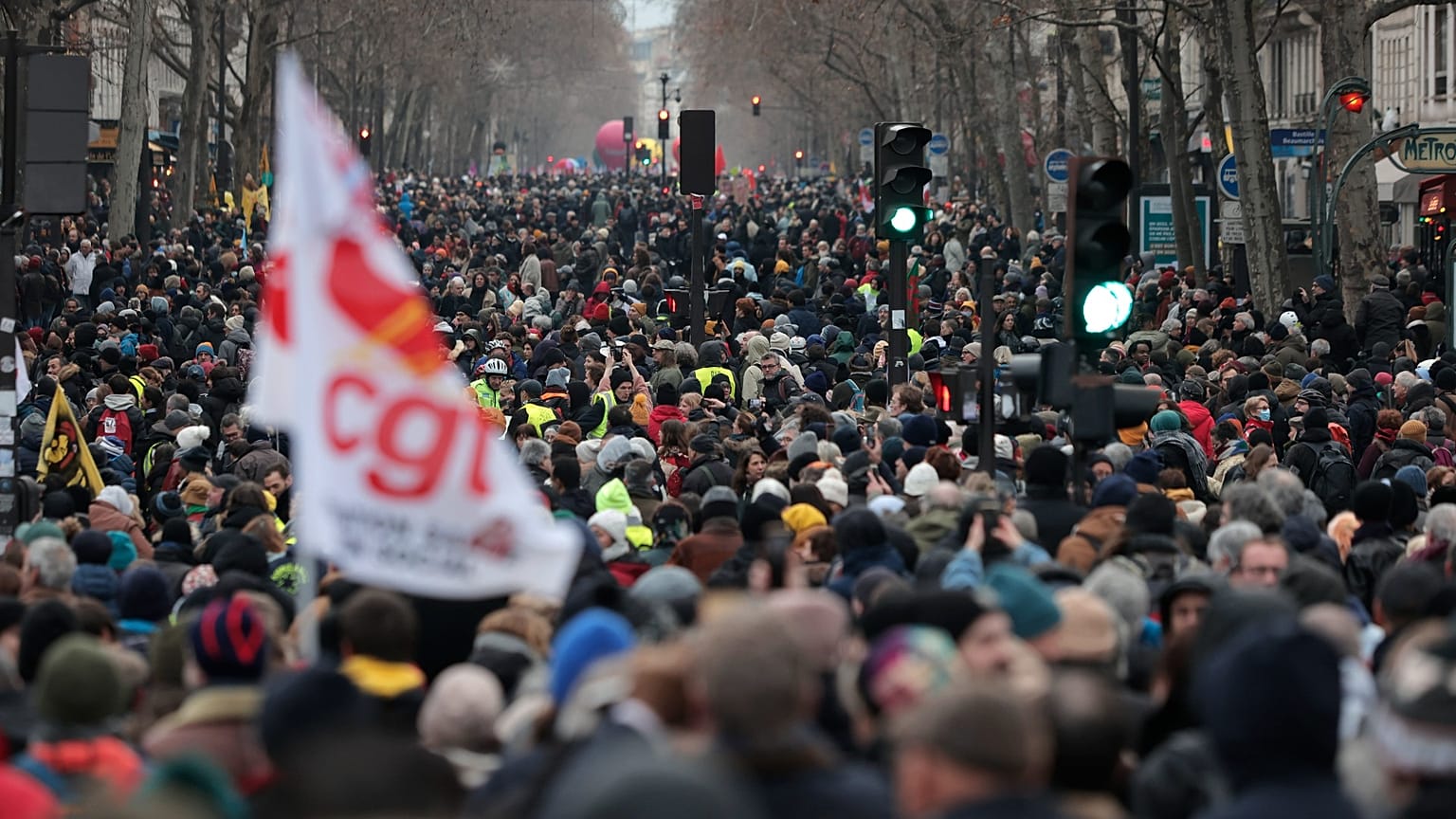 Protesters march during a demonstration against pension changes in Paris. Workers in many French cities took to the streets Thursday to reject proposed pension changes.