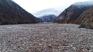 Waste floating in the Drina river near Visegrad, Bosnia, Friday, Jan. 20, 2023
