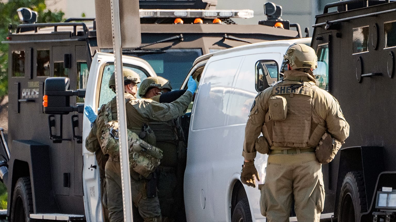An hours-long manhunt led police to surround and enter the van where the suspect shot himself, according to authorities.