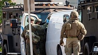 An hours-long manhunt led police to surround and enter the van where the suspect shot himself, according to authorities.