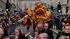 A Chinese dragon from the Chinese Soho society performs during the New Year's Day parade in London.