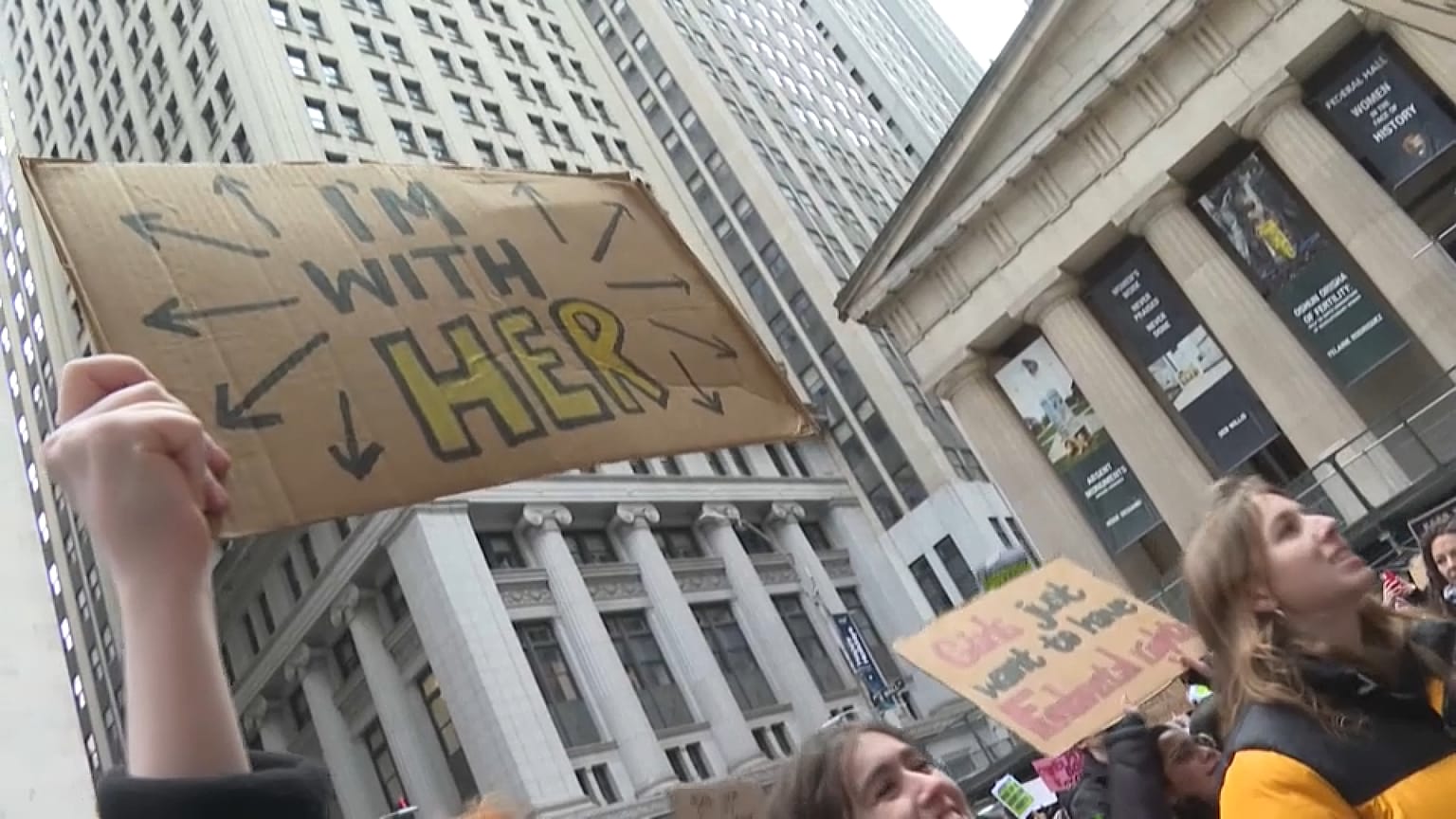 Protesters defending abortion rights chanted and held signs as they gathered in Wall Street, New York.
