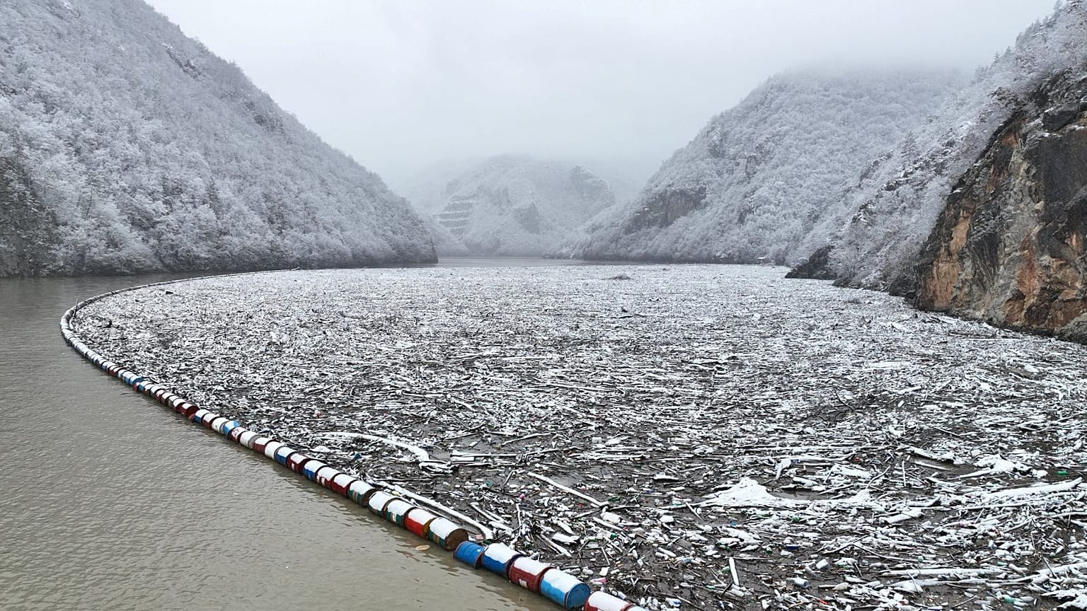 Tons of floating waste blocks the Drina river near Visegrad.