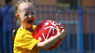 Young girl enjoying the sporting activities at the Special Olympics Moldova Young Athletes Festival held in Chisinau in 2019.