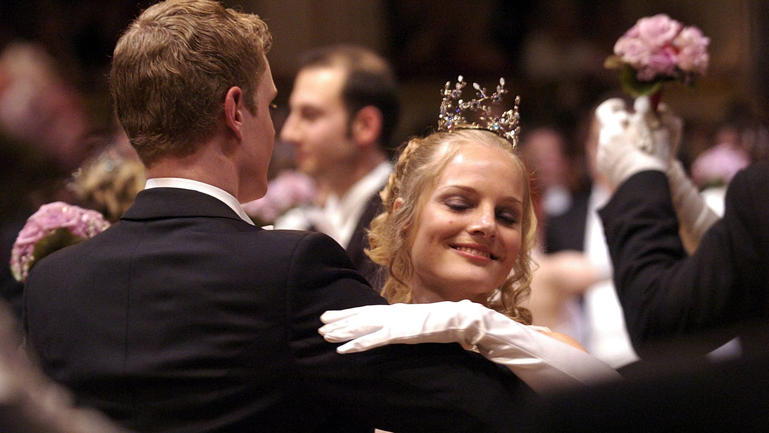 Professional dancers glide to the Wiener Waltz during the opening of the celebrated Opera Ball in Vienna