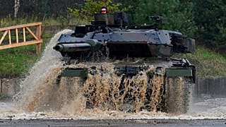 A soldier in a Leopard 2 A7  at the military training area in Munster, northern Germany, on October 13, 2017.