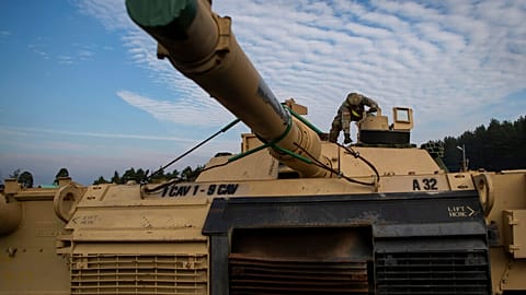  File photo of US Army's 1st Armored Battalion from Fort Hood in Texas prepare to unload Abrams battle tanks from rail cars as they arrive in Vilnius, Lithuania.