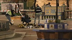 Police work next to the body of a man killed in Algeciras, southern Spain, Wednesday, 25 Jan. 2023. 