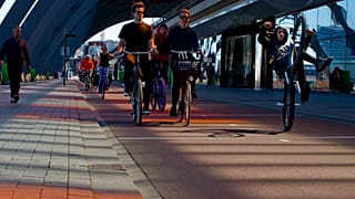 People cycling in Amsterdam, Netherlands in April 2020.