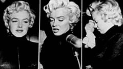 Tears well in the eyes of movie actress Marilyn Monroe as she faces reporters outside her home, October 6, 1954