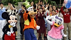 From left to right, Disney characters Mickey Mouse, Goofy and Daisy Duck at Hong Kong Disneyland.