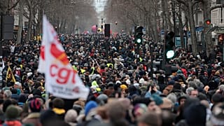 FILE - Protestors march during a demonstration against pension changes, Thursday, Jan. 19, 2023 in Paris.