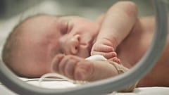 A newborn baby in the neonatal intensive care unit in Bucharest, Romania - 2012 archive