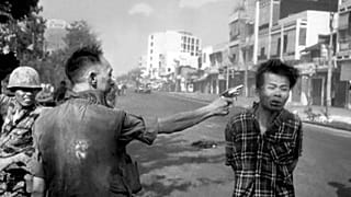 South Vietnamese General Nguyen Ngoc Loan, chief of the National Police, fires his pistol into the head of suspected Viet Cong officer Nguyen Van Lem 